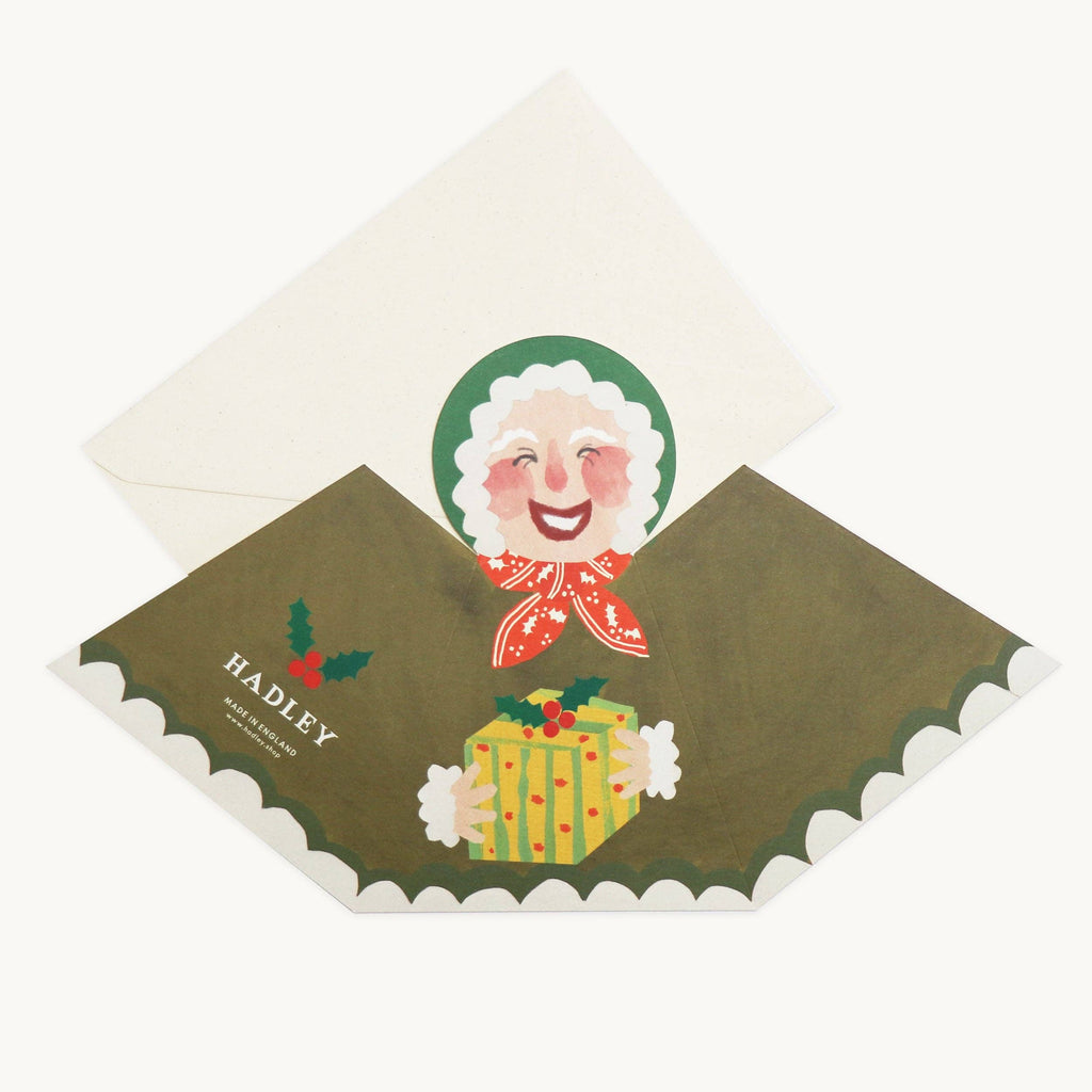 Uitgevouwen mevrouw Claus kaart op de plank