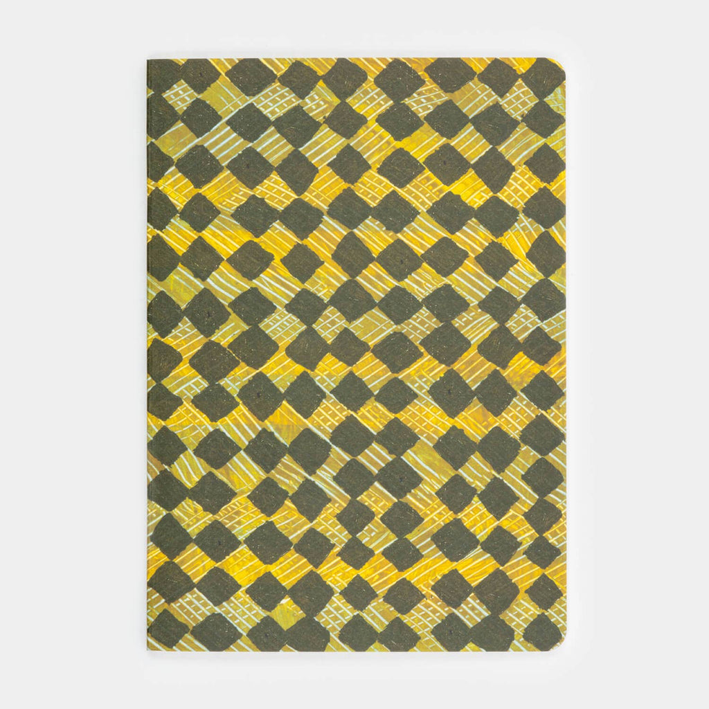 Geel schetsboek met geschilderde diamanten, vooraanzicht
