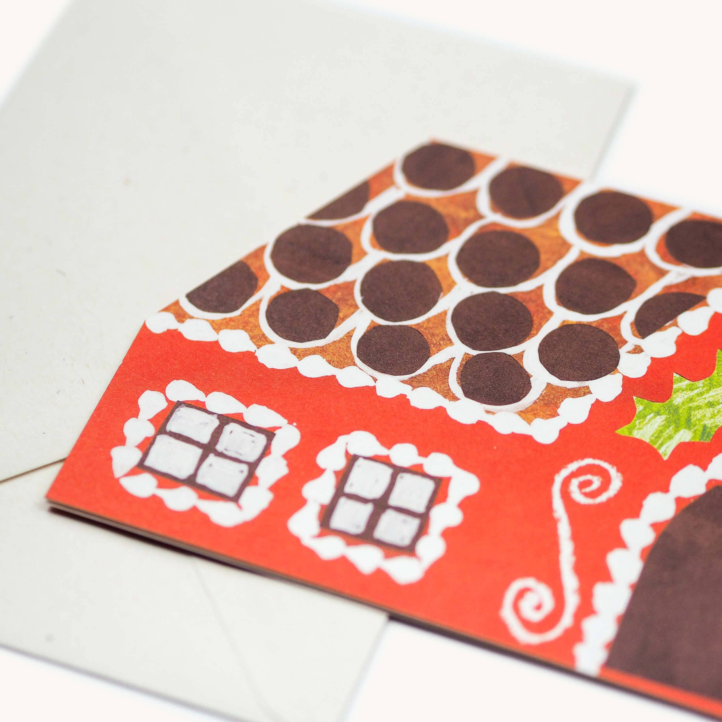 Peperkoekhuis kerstkaart, detail van het uitgesneden huisje