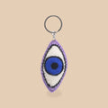 Wollen sleutelhanger oog, beige studio