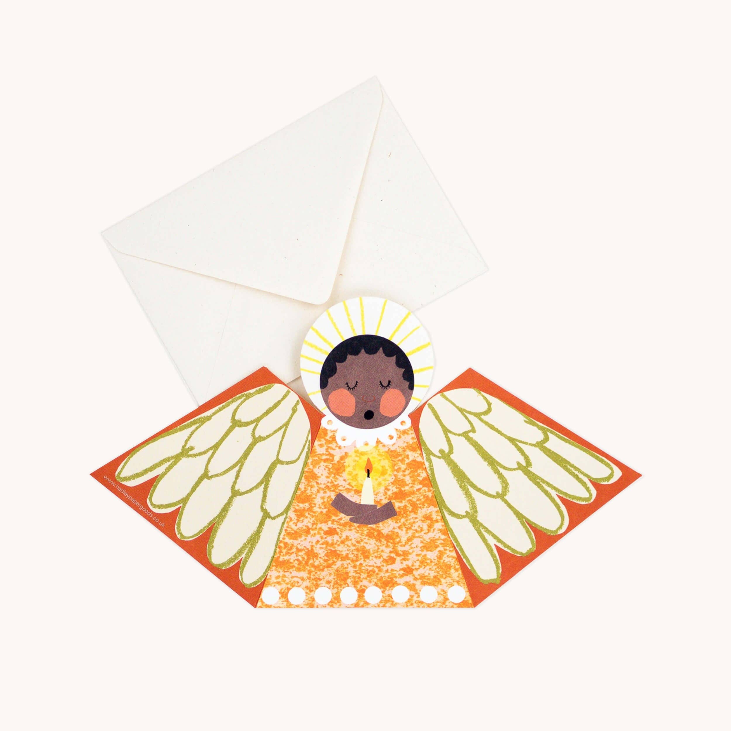 Oranje engel kerstkaart met crèmekleurige envelop