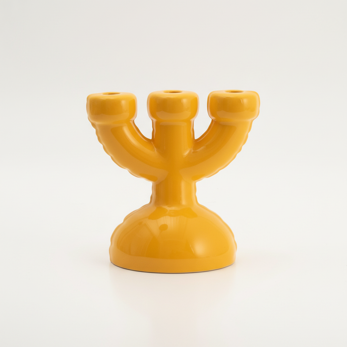 Gele kandelaar studio packshot