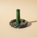 Groene twisted kandelaar warme achtergrond