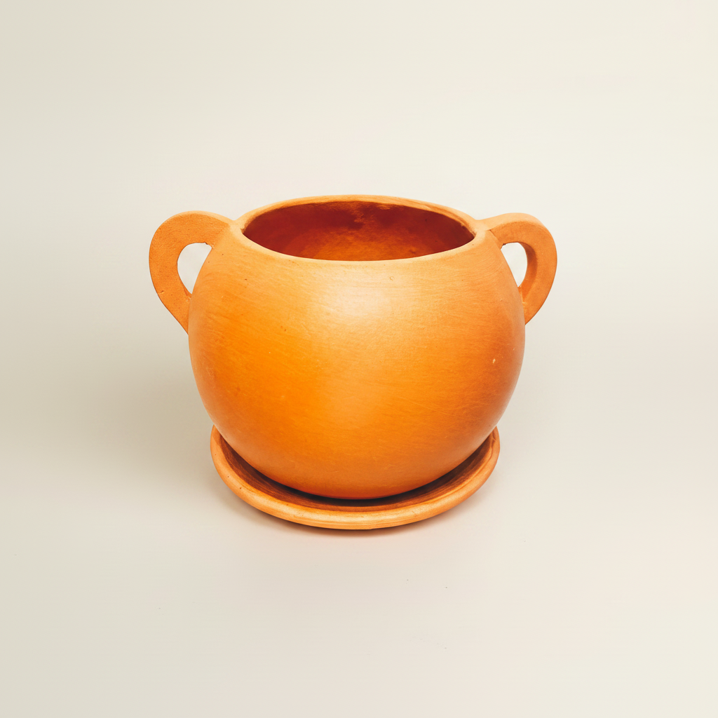 Terracotta pot met oren warme achtergrond